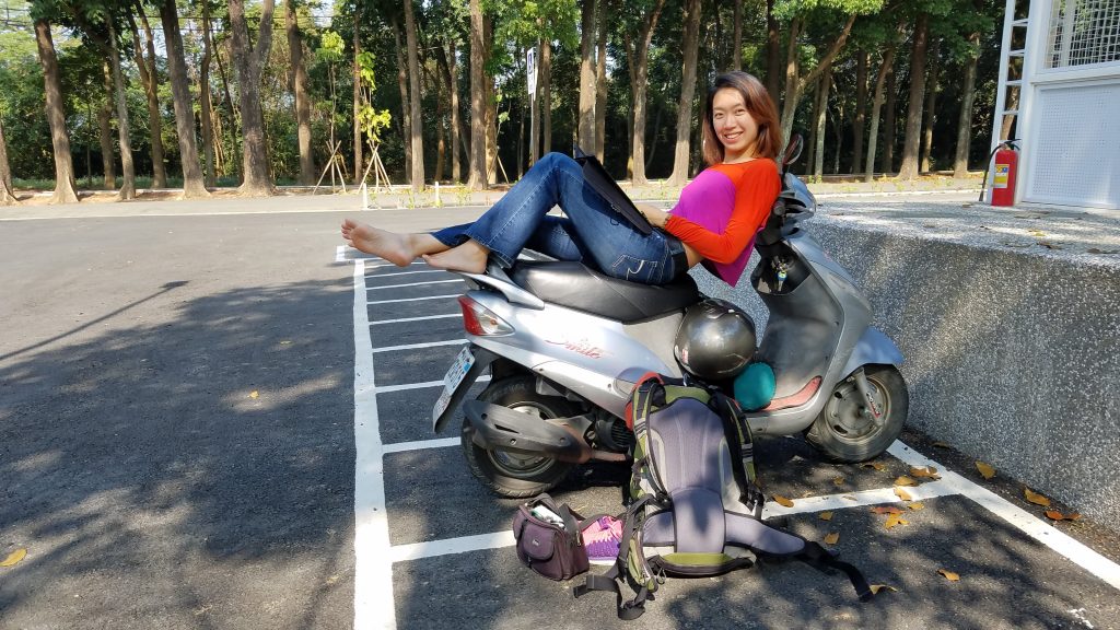 digital nomad remote worker working on a scooter